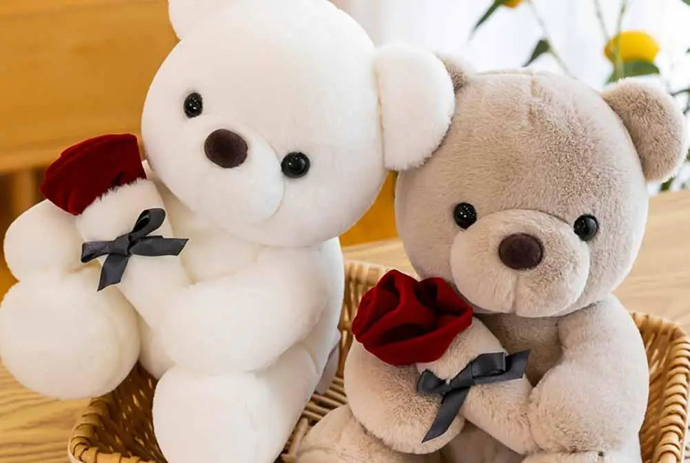 Oso de peluche con rosa